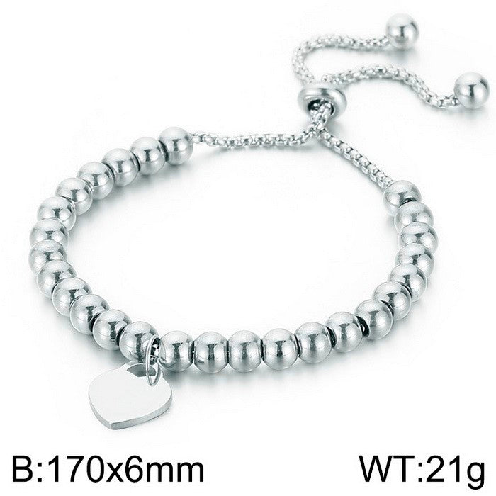 Pulsera plateada corazon /bolita acero inoxidable 316L