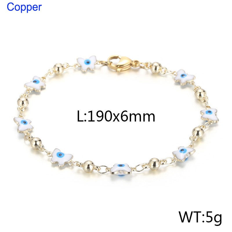 Pulsera mariposas ojitos turcos blancos oro 14K laserado