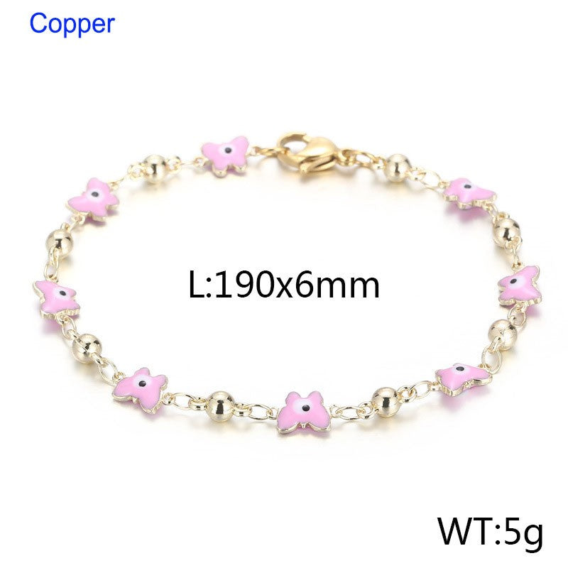 Pulsera mariposas ojitos turcos rosados oro 14K laserado
