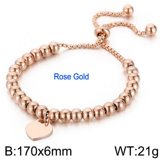 Pulsera rosada   corazon /bolita acero inoxidable 316L